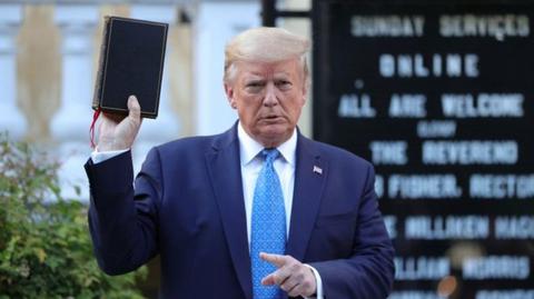 small_hands_don_and_bible.jpg