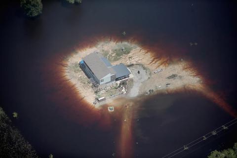 floodwater_surrounded_home.jpg